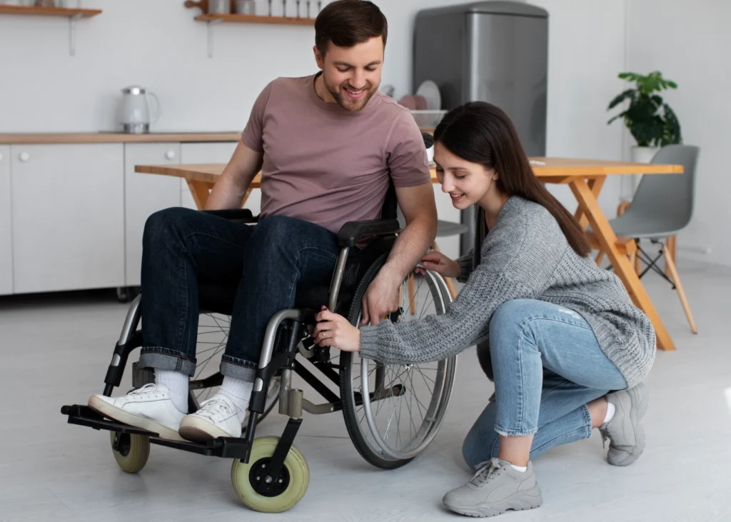 young-adult-helping-disabled-friend